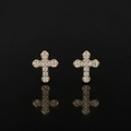 Aretes de cruz con diamantes
