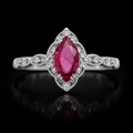 Anillo de rubí central con diamantes