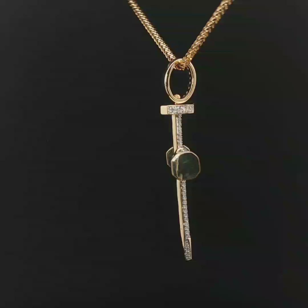 Dije cruz de clavo diamantes naturales en oro 14k.
