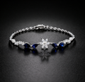 Pulsera de diamantes y zafiros naturales en oro 18k