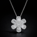 Dije de flor y diamantes naturales en oro blanco 14k