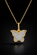 Dije de mariposa en oro con diamantes naturales